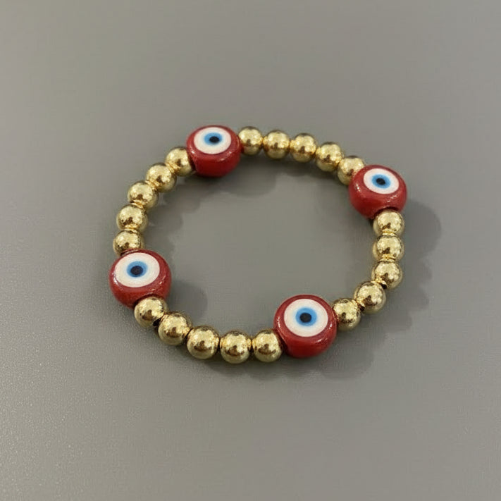 RED AND GOLD EVIL EYE BRACELET