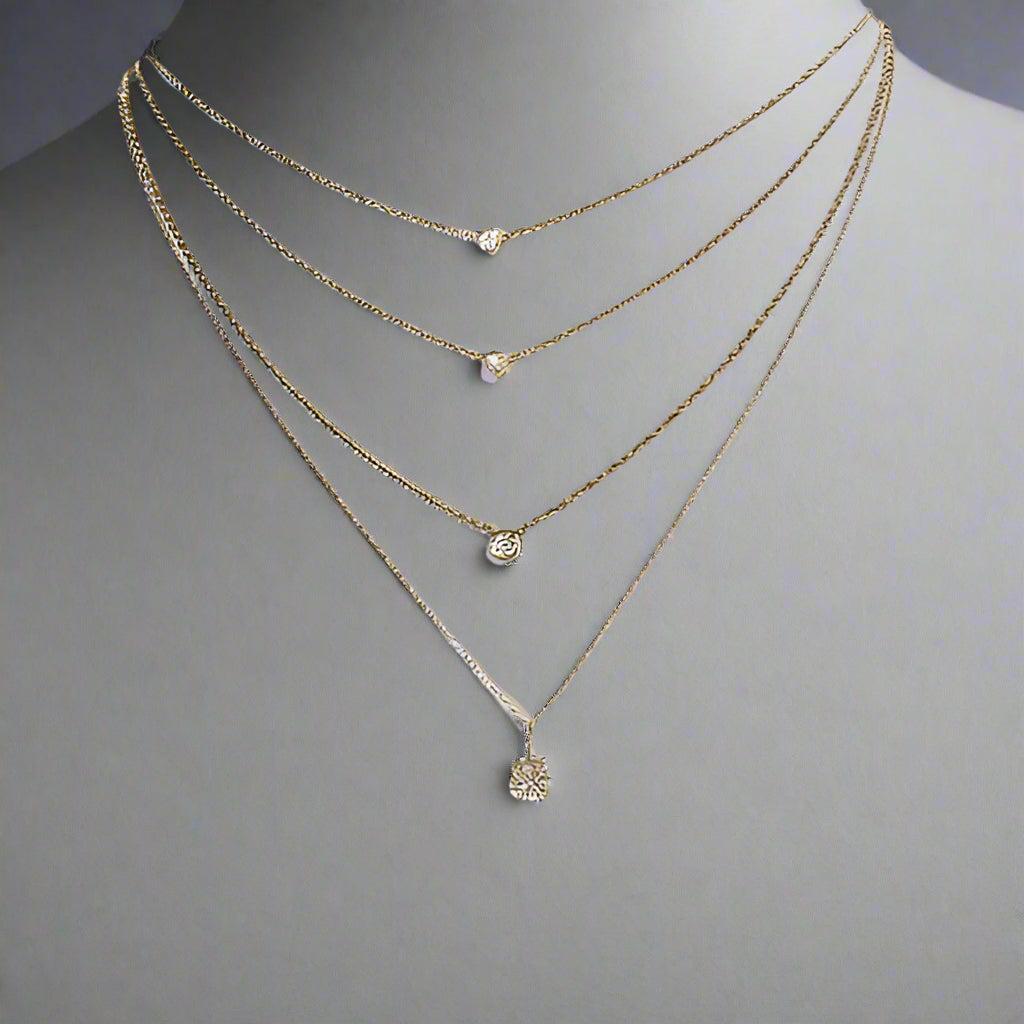 FLOATING DIAMOND 14KT GOLD CHAIN