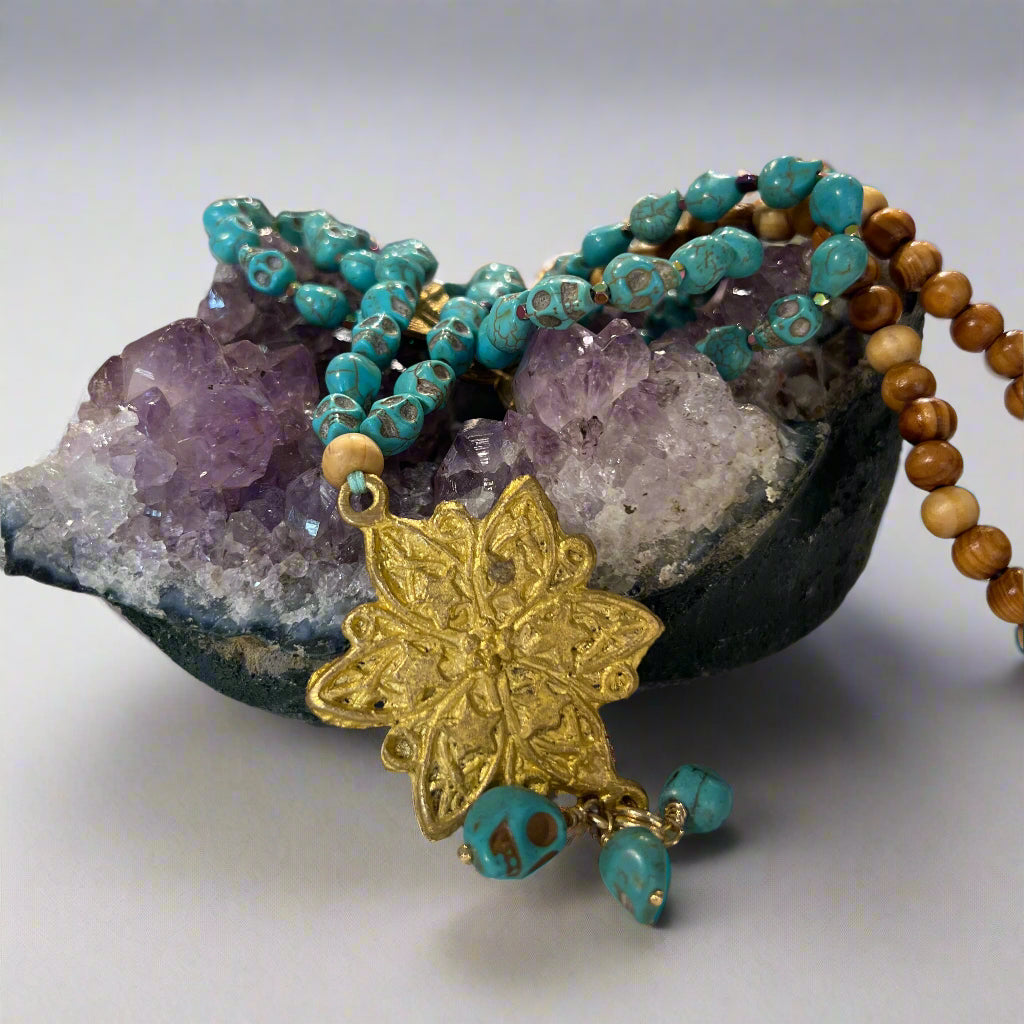 TURQUOISE LOTUS VINTAGE CHARM SKULL