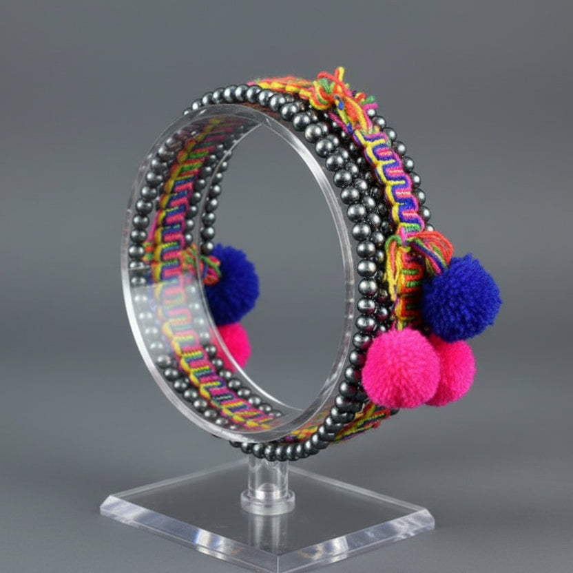 PEARL AND POM POM BRACELET
