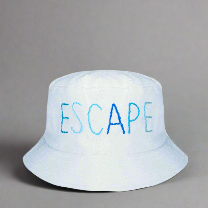 HAPPY GO LUCKY ESCAPE HAT
