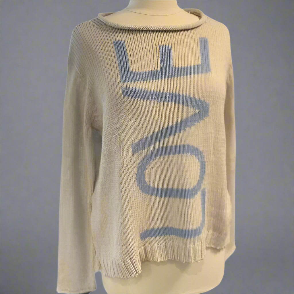 A beige and blue crew neck sweater with the word 'LOVE' knitted on the front.