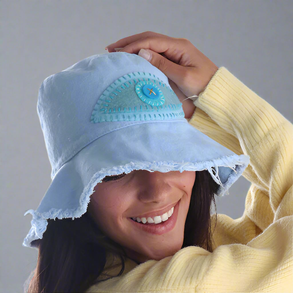 CANVAS BUCKET HAT WITH EVIL EYE