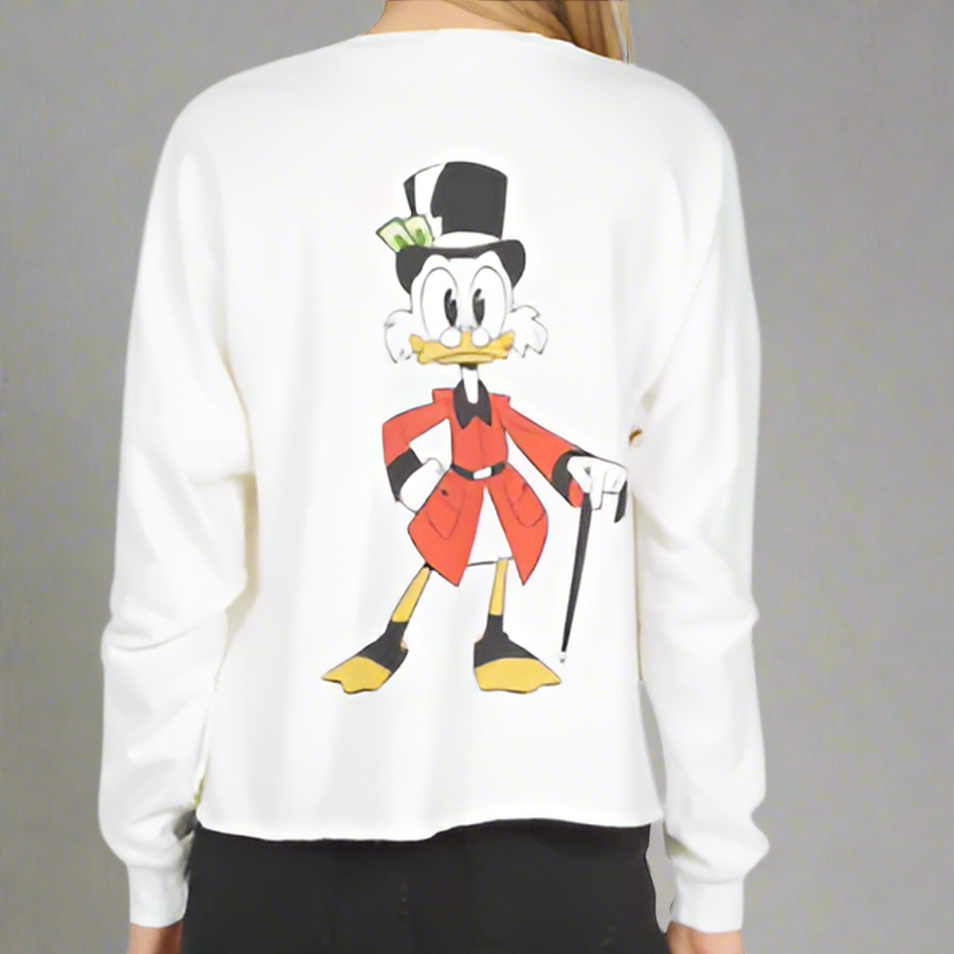 White sweatshirt with a cartoon character on the back against a gray background
