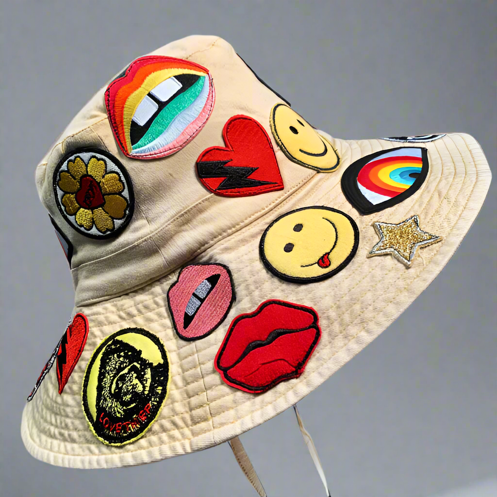 ADINA BUCKET HAT W/ ALLOVER HIPPIE PATCHES