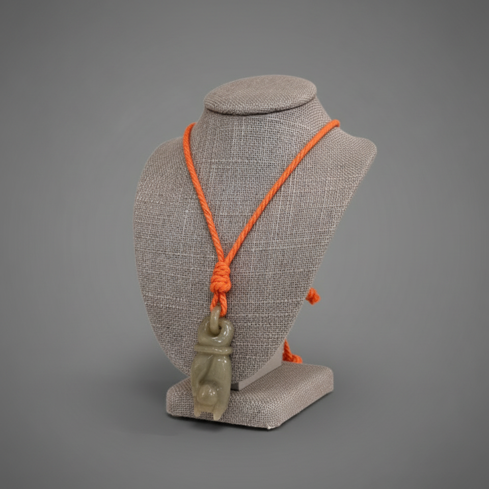 JADE CARVED CORD NECKLACE