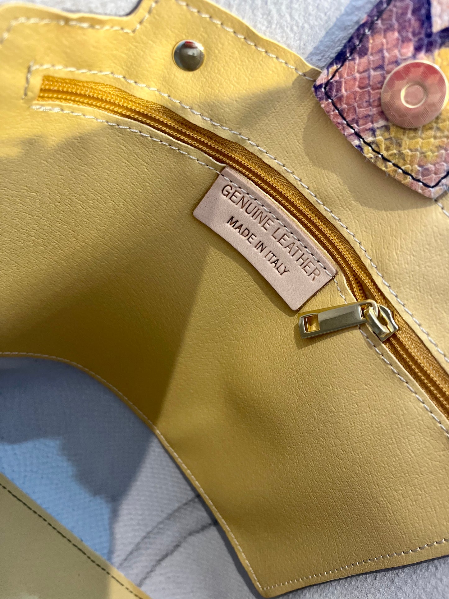 SNAKE PRINT LEATHER TOTE WITH A POUCH