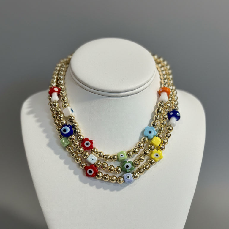 MUSHROOM FLORAL EVIL EYE NECKLACE