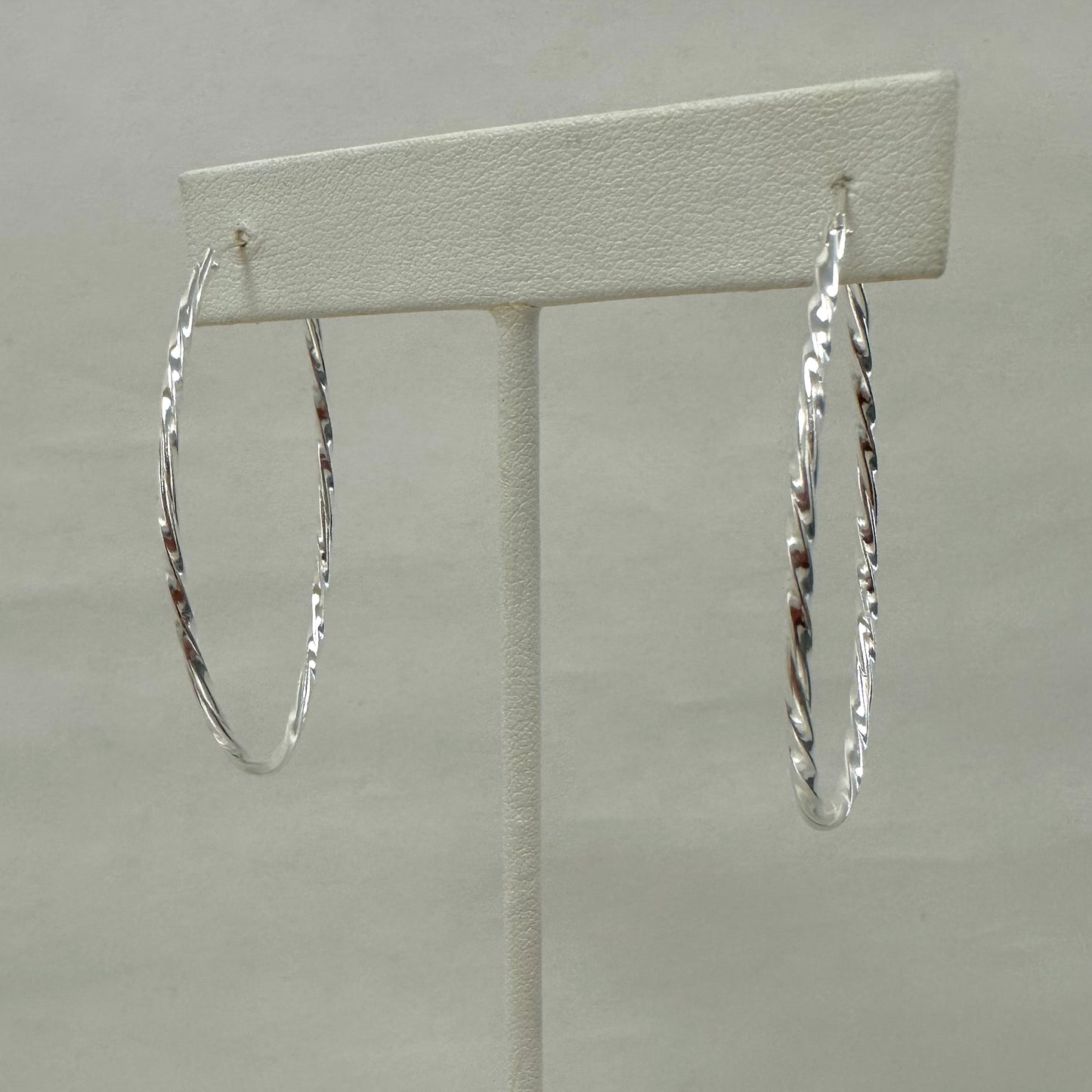 STERLING TWISTED OVAL HOOPS