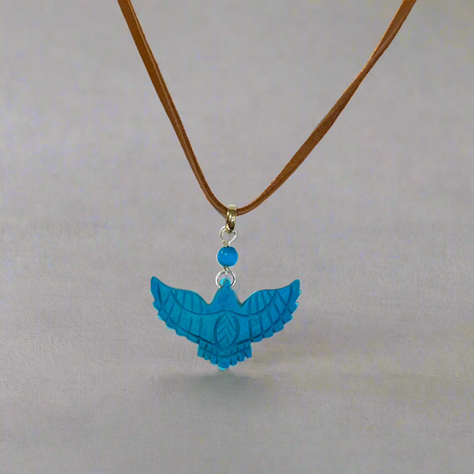 TURQUOISE THUNDERBIRD ON LEATHER