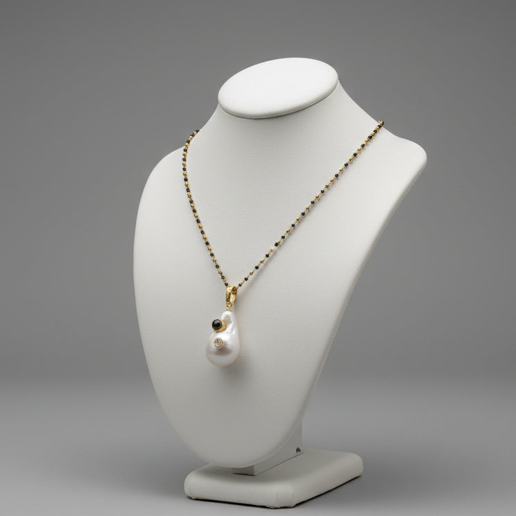 PEARL DROP ON BEADED CHAIN