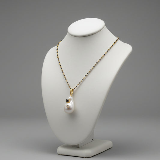 PEARL DROP ON BEADED CHAIN