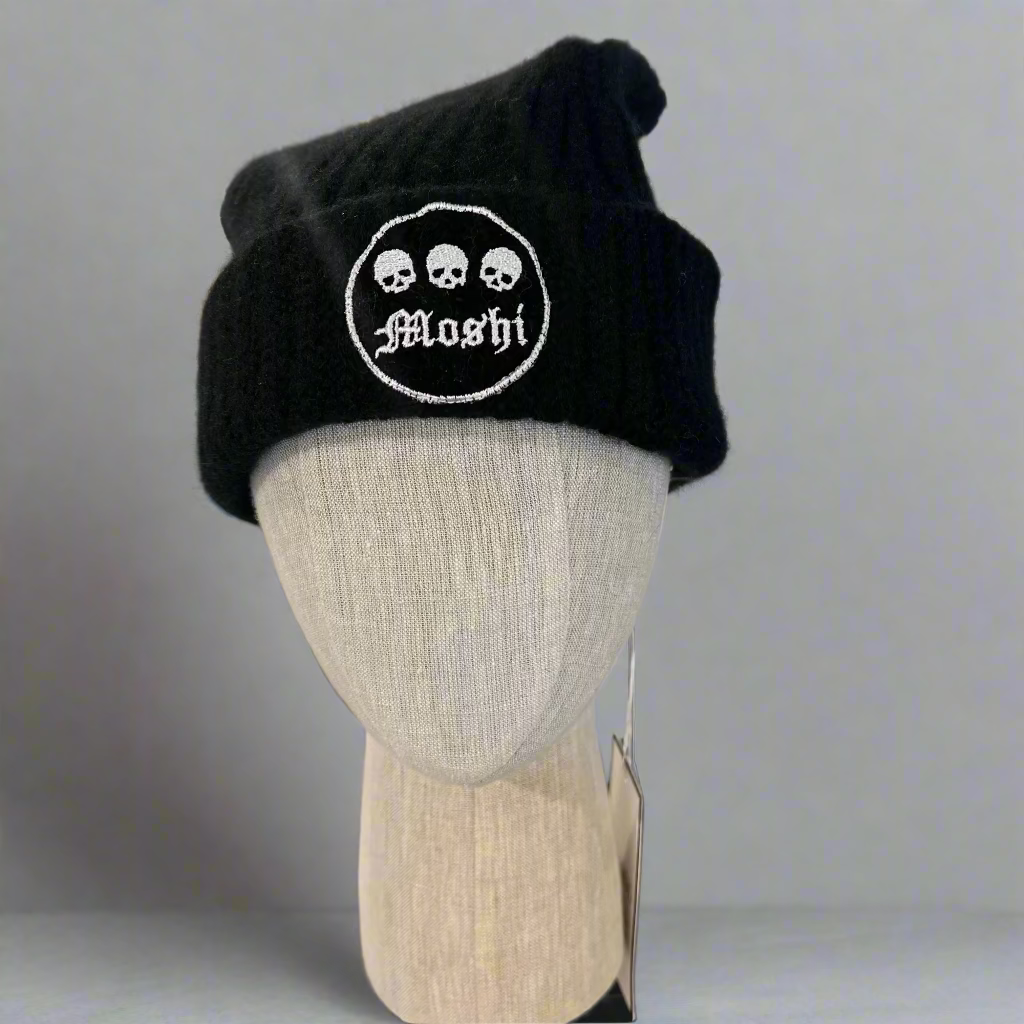 Black beanie with 'Moshi' logo on a mannequin head in a store setting