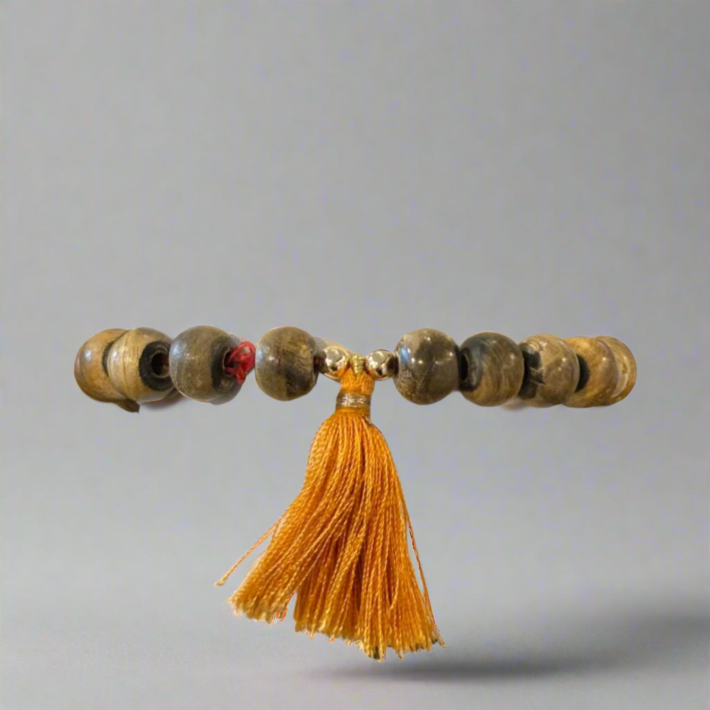 MALA WOOD WITH TASSEL BRACELET