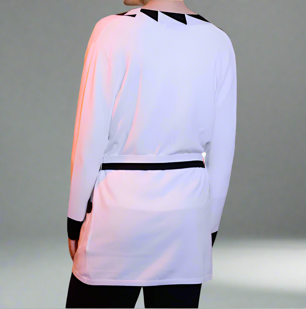 back of a cardigan on a dark background
