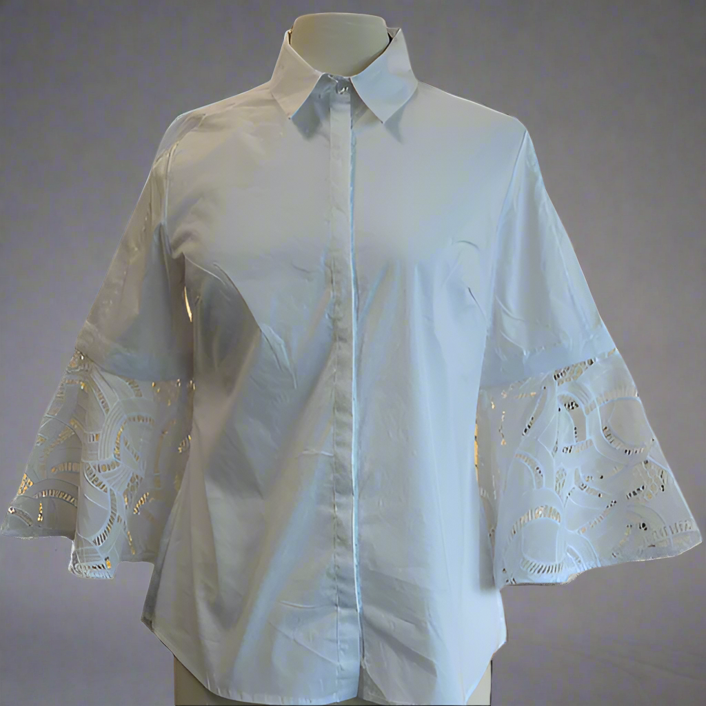 White blouse with lace sleeves on a mannequin against a white background