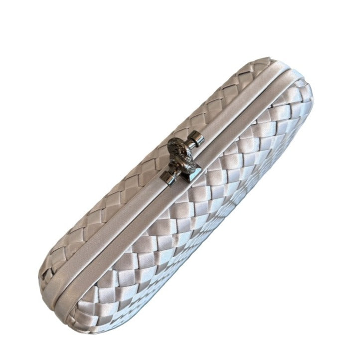 WOVEN PATTERN CLUTCH WITH KNOT LOCK