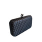 WOVEN PATTERN CLUTCH WITH KNOT LOCK