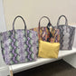 SNAKE PRINT LEATHER TOTE WITH A POUCH