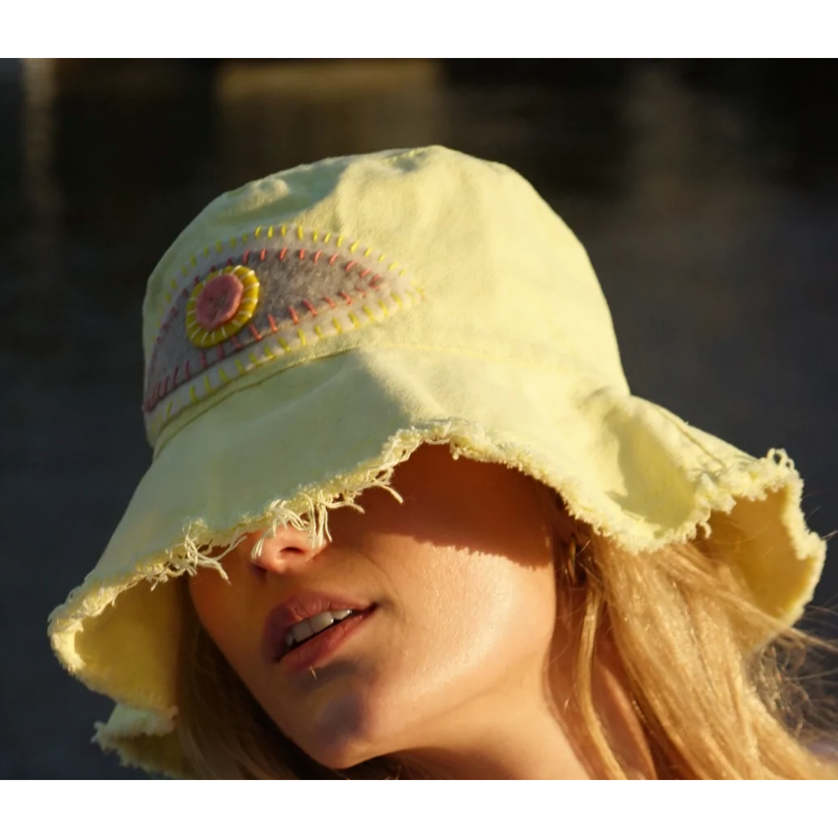 CANVAS BUCKET HAT WITH EVIL EYE